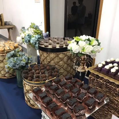 Chocolate truffles and dessert cups at an evening event